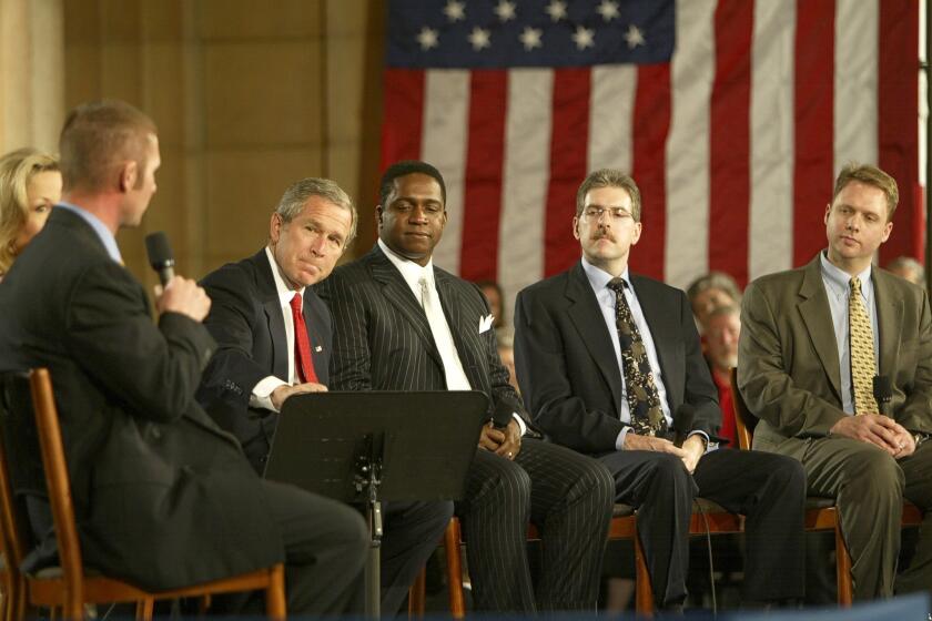 Andrew Biggs (far right) at a 2005 meeting to promote George W. Bush's Social Security privatization plan.
