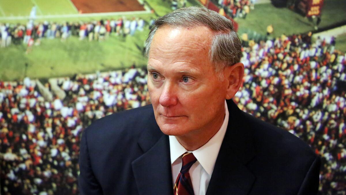 Then-USC Athletic Director Pat Haden watches a news conference at USC on Oct. 13, 2015.