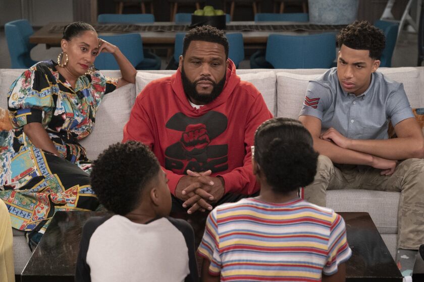 BLACK-ISH - "Purple Rain" - The family is shocked to learn that Jack and Diane are not familiar with the iconic music of Prince. One by one, each member of the family works to explain Prince's tremendous impact on their lives through his music, on the 100th episode of "black-ish," TUESDAY, NOV. 13 (9:00-9:30 p.m. EST), on The ABC Television Network. (ABC/Eric McCandless) TRACEE ELLIS ROSS, ANTHONY ANDERSON, MARCUS SCRIBNER