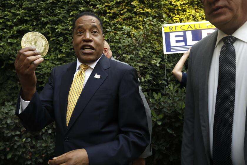 WOODLAND HILLS, CA - AUGUST 24, 2021 - Conservative radio talk show host Larry Elder, who is running for governor of California, greets supporters at the Warner Center Marriott in Woodland Hills on August 10, 2021. (Genaro Molina / Los Angeles Times)