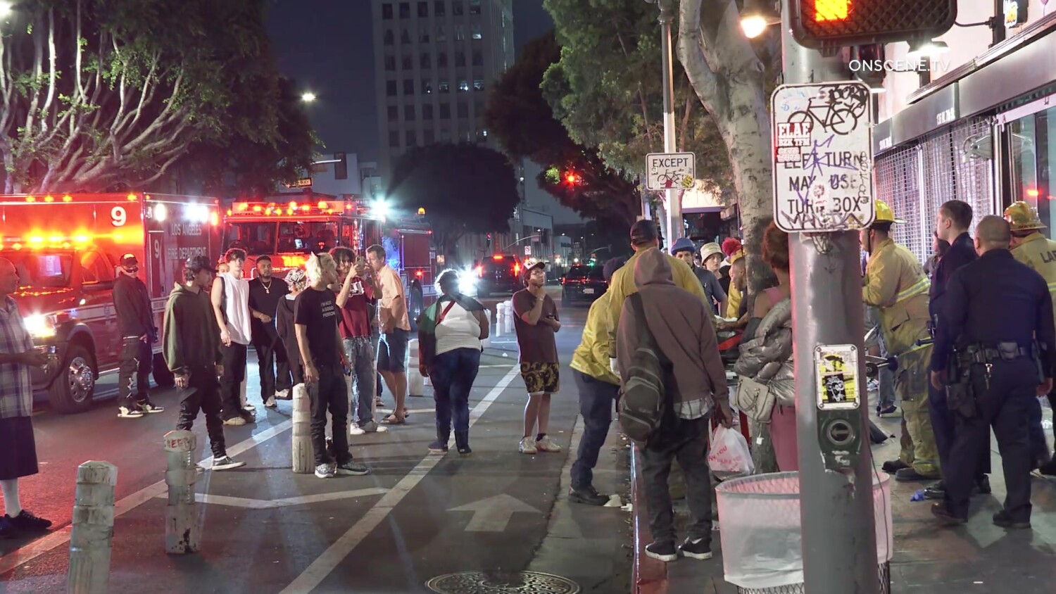 Two suspects still at large after four are shot in downtown L.A.