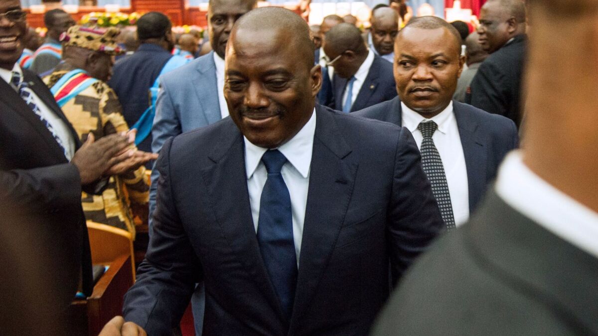 Congolese President Joseph Kabila, due to step down in December, at a joint session of parliament after a controversial deal to extend his term. The deal was rejected by the main opposition parties.
