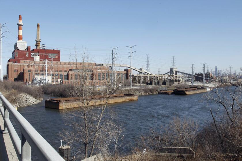 Midwest Generation's Crawford Generating Station, a coal-fired power plant in Chicago. EPA regulations adopted in December restrict coal plants' emission of mercury and other toxic chemicals, which have been found to be a significant health hazard.