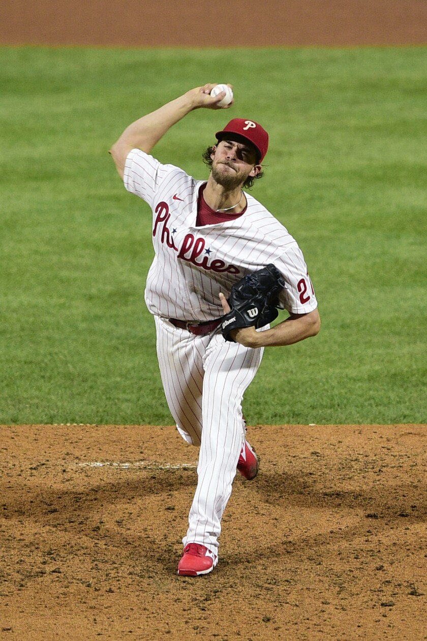 Philadelphia Phillies' Aaron Nola throws the ball during the fourth inning of a baseball game against the Milwaukee Brewers, Tuesday, May 4, 2021, in Philadelphia. (AP Photo/Derik Hamilton)
