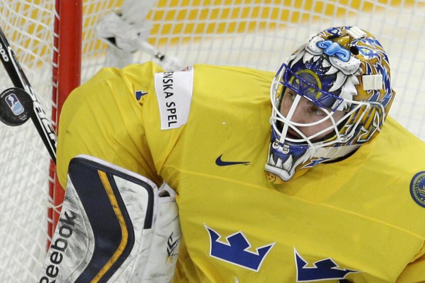 Sweden’s Jhonas Enroth makes a save during an IIHF World Championship group game against the Czech Republic on May 9. The L.A. Kings have signed Enroth to a one-year deal worth $1.25 million.