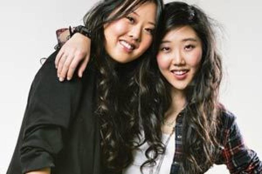 SIBLING SYNERGY: Linda Chang, left, heads marketing and Esther Chang oversees the visuals department.
