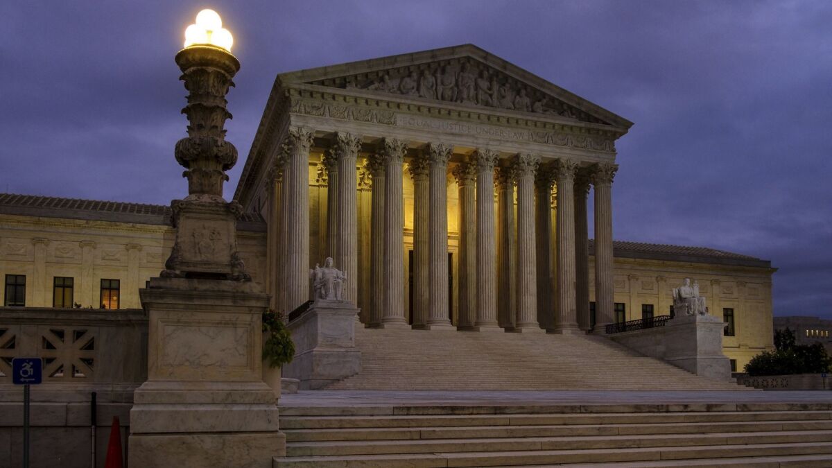 The Supreme Court building before dawn in Washington on Oct. 5.
