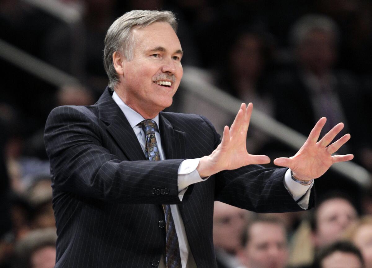 Mike D'Antoni, who previously coached the Phoenix Suns and the New York Knicks, has signed a $12-million contract to coach the Lakers.