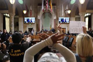 LOS ANGELES, CA - OCTOBER 12, 2022: Members of the community are calling for the resignation of Nury Martinez, Kevin de Leon and Gil Cedillo at City Hall Council chambers in downtown Los Angeles on Wednesday, October 12, 2022. (Christina House / Los Angeles Times)