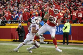 Kansas City Chiefs tight end Travis Kelce (87) makes the game winning reception in the end zone against the Buffalo Bills 