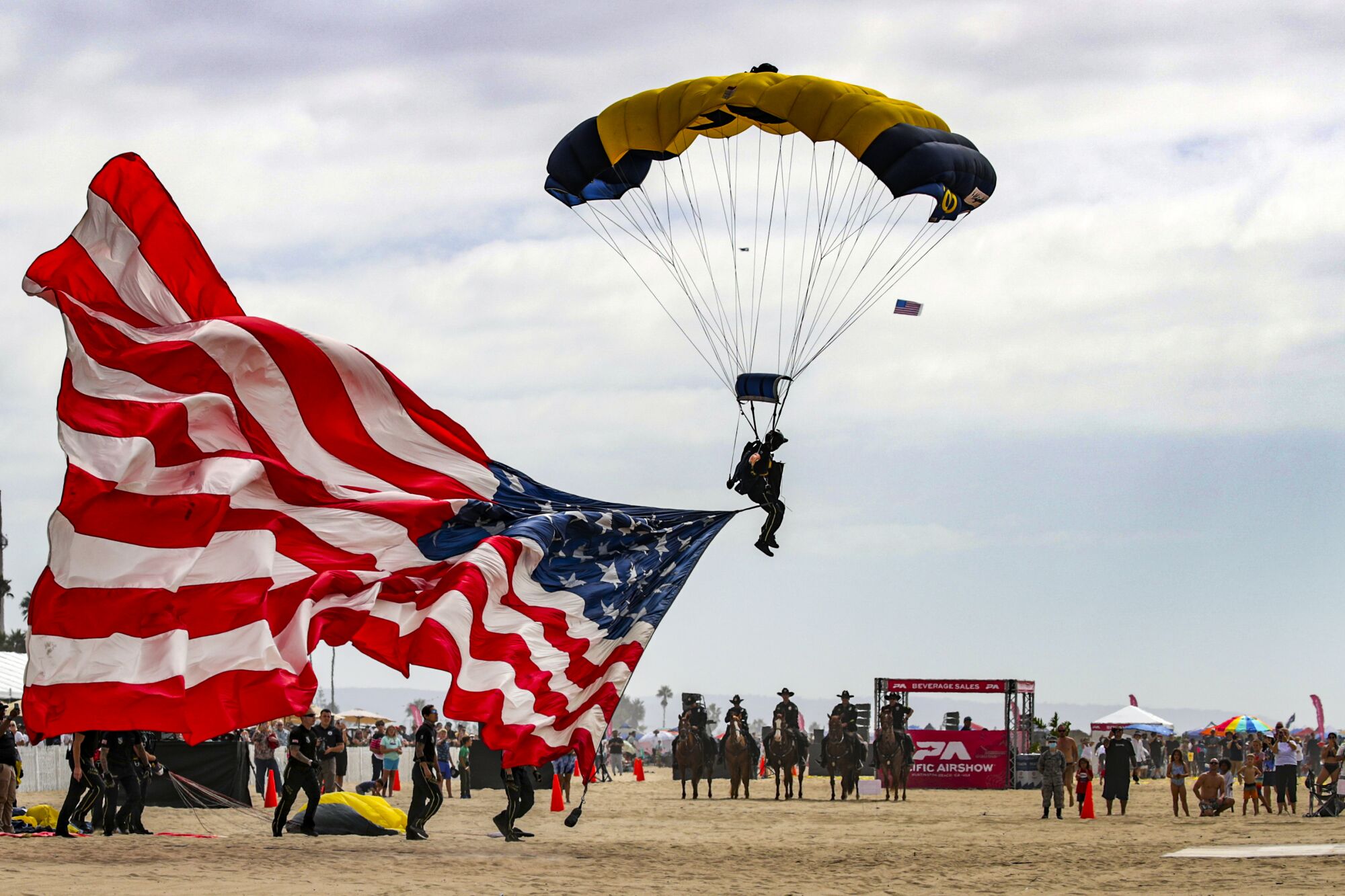 U.S. Navy Leap Frogs perform parachute jumping during the Pacific Airshow