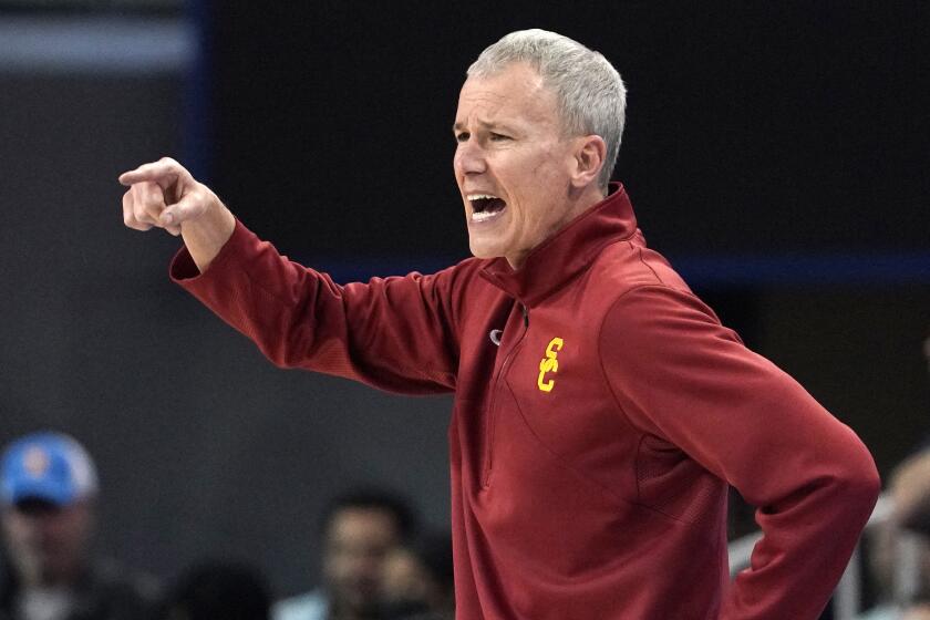 Southern California head coach Andy Enfield yells 