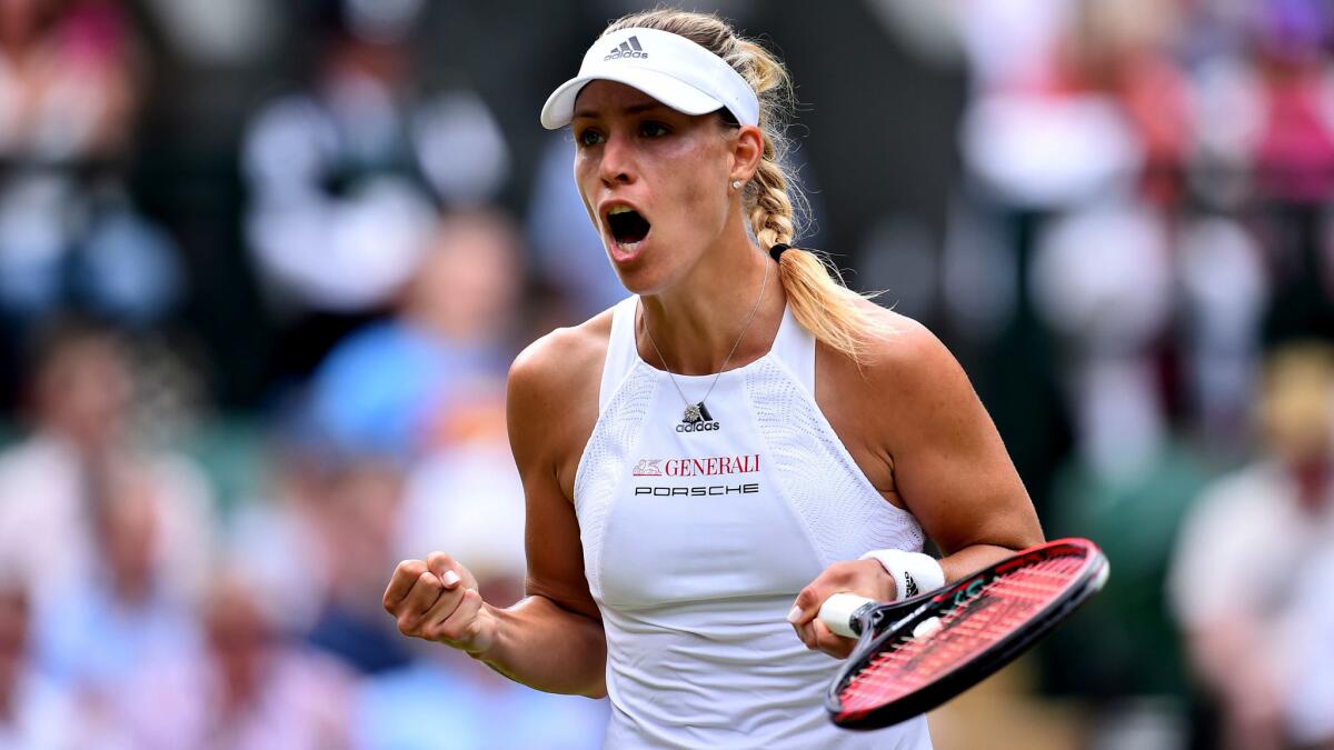 Angelique Kerber reacts after winning a point against Irina Falconi during their first-round match at Wimbledon on Tuesday.
