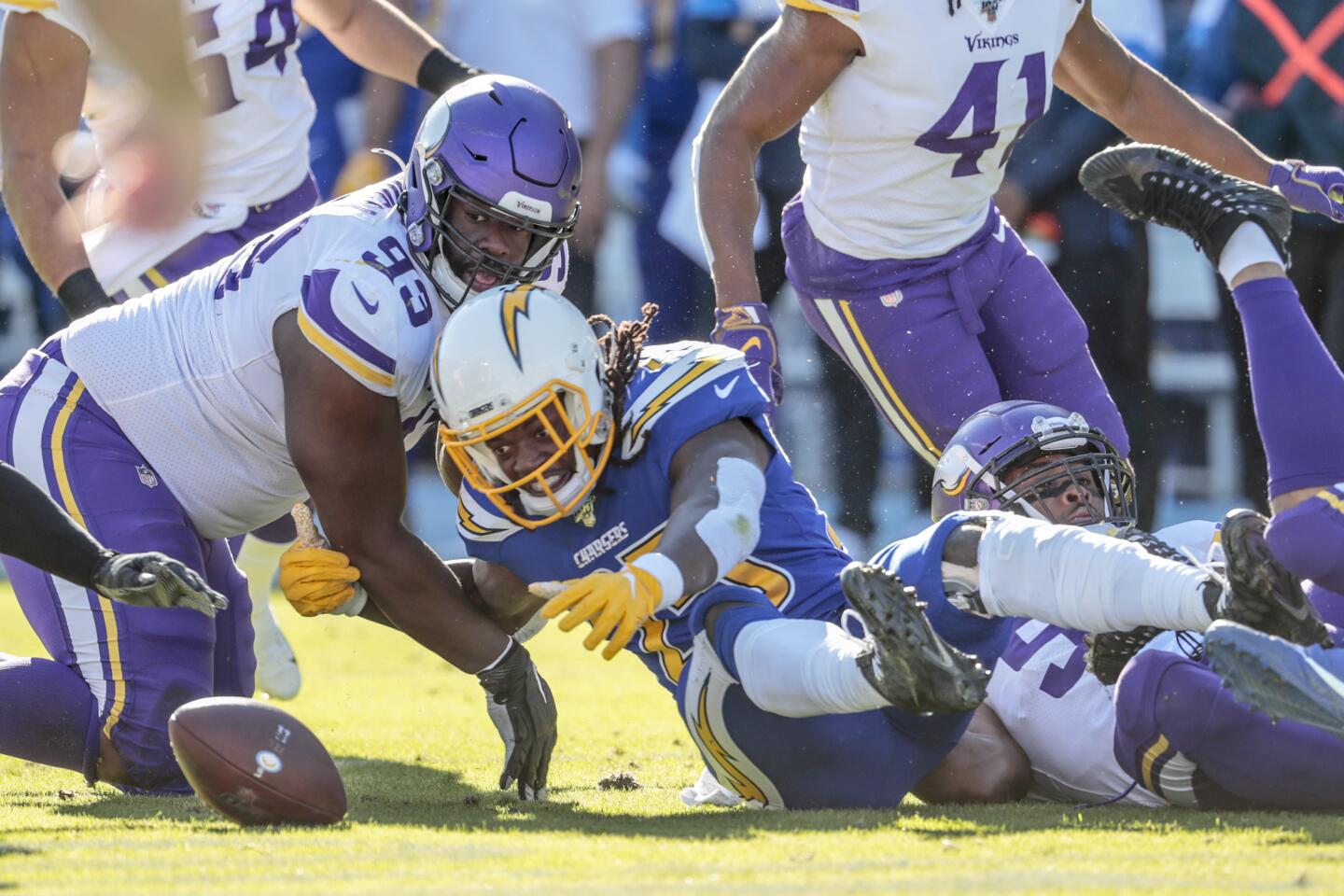 CARSON, CA, SUNDAY, DECEMBER 15, 2019 - Los Angeles Chargers running back Melvin Gordon (25) fumbles the ball during a first quarter drive against the Vikings at Dignity Health Sports Park. (Robert Gauthier/Los Angeles Times)