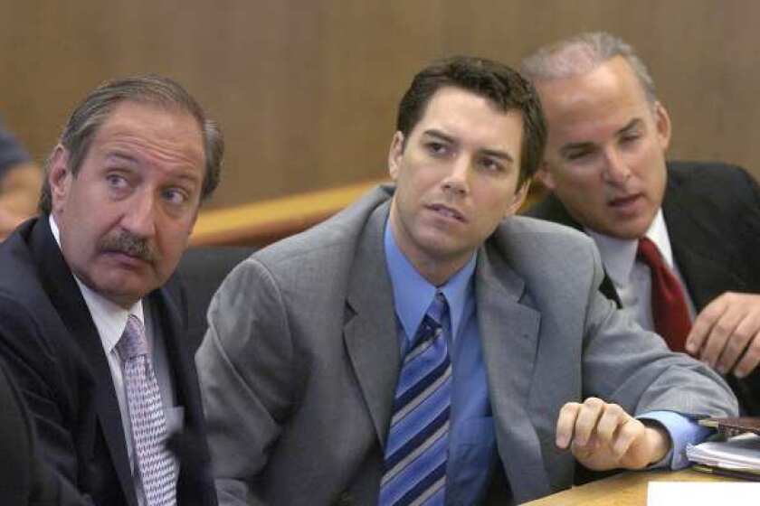 Scott Peterson, center, during his murder trial in 2004.