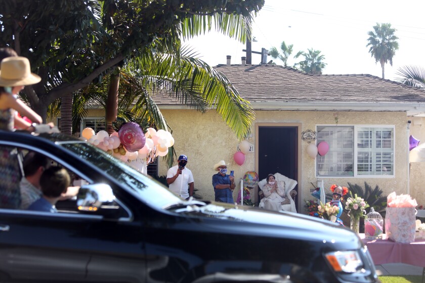 Column: How do you show up en masse to celebrate Grandma's
birthday without killing her with COVID-19? 4 A car caravan for Angelita Arellano.