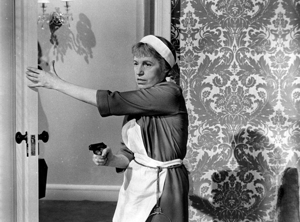 Lotte Lenya brandishes a gun in a scene from the film "From Russia With Love"