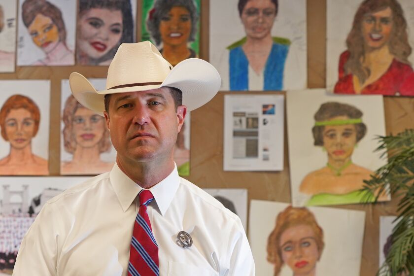 Texas Ranger James Holland is the "serial killer whisperer." During his 20-year career in the Rangers, he has become an expert in eliciting confessions from mass murderers. Most recently, he engaged in his longest months-long interrogation of Samuel Little, who admitted to Holland he killed 93 men and women over the course of four decades. Holland is pictured in his office in Decatur, Texas, photographed on Wednesday, August 28, 2019. CREDIT: Louis DeLuca for The Los Angeles Times 463430-LA-NA-POL-Texas-Ranger