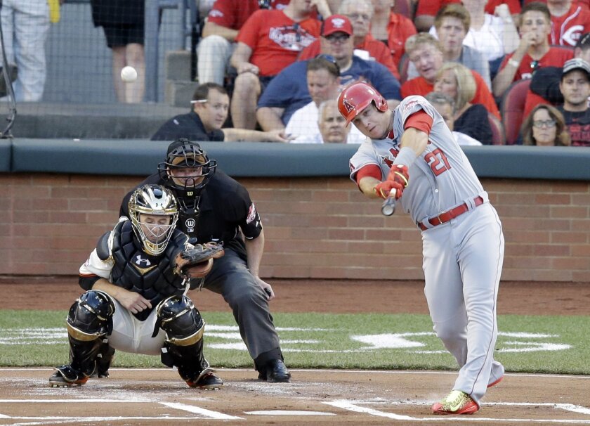 American League's Mike Trout, of the Los Angeles Angels, hits a home run during the first inning of the MLB All-Star baseball game, Tuesday, July 14, 2015, in Cincinnati. (AP Photo/Michael E. Keating )