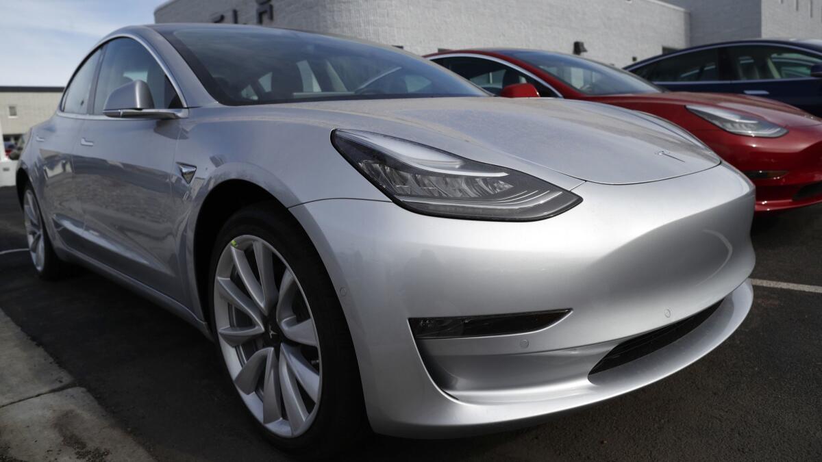 A Model 3 on a Tesla retail lot in Denver.