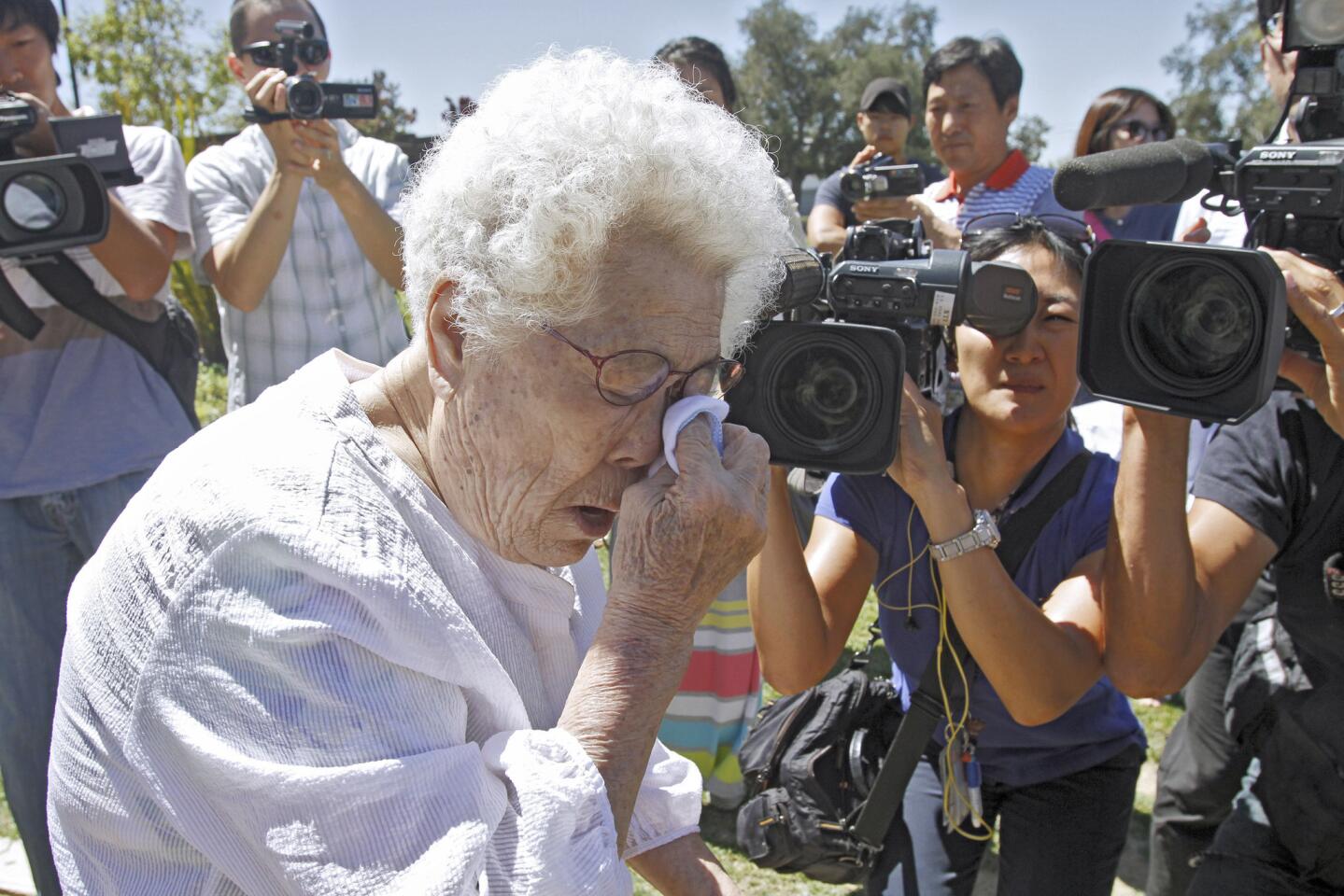 Former Japanese Imperial army sex slave Ok-Seon Lee, 87, wipes tears away after visiting the Peace Monument dedicated to comfort women at Central Park in Glendale on Thursday, July 24, 2014. The Korean woman was used as sex slave during World War II by the Japanese army.