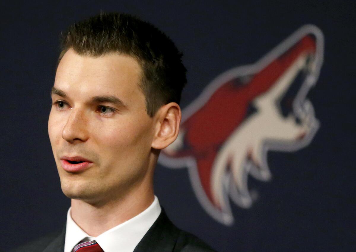 Newly appointed Arizona Coyotes General Manager John Chayka speaks at a news conference announcing his promotion May 5 by the NHL team.