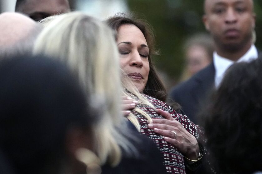 Vice president Kamala Harris hugs Highland Park, Ill., mayor Nancy Rotering as Harris departs after a visit to the site of Monday's mass shooting at the Highland Park July 4th parade, Tuesday, July 5, 2022, in Highland Park, Ill. (AP Photo/Charles Rex Arbogast)