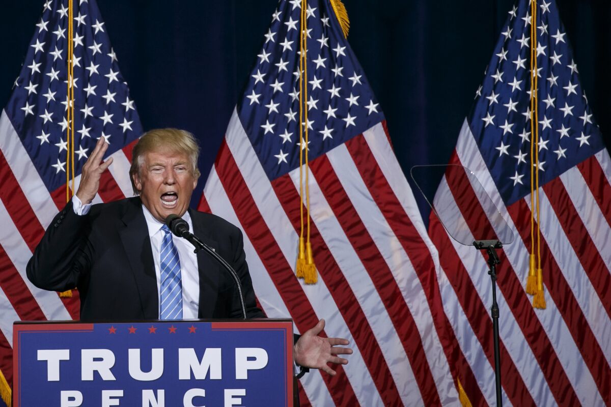 Donald Trump lays out his immigration policy at a rally in Phoenix.