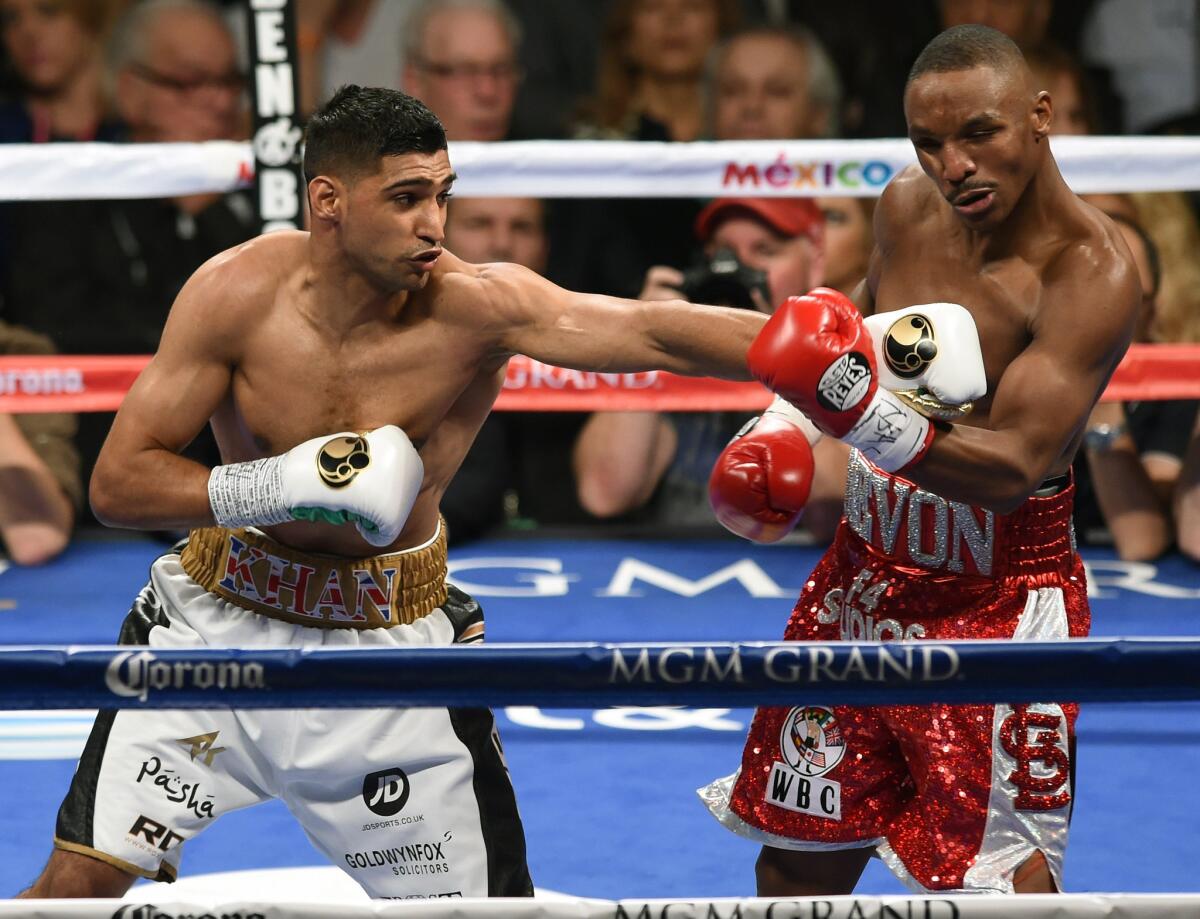 Amir Khan, left, earned a long look at possibly becoming Floyd Mayweather Jr.'s next opponent with his unanimous-decision victory over Devon Alexander on Saturday night.