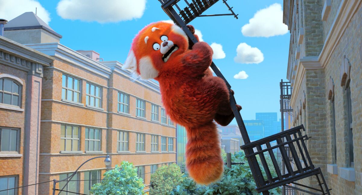 A giant red panda hangs from a staircase in a scene from the animated film "Turning Red."