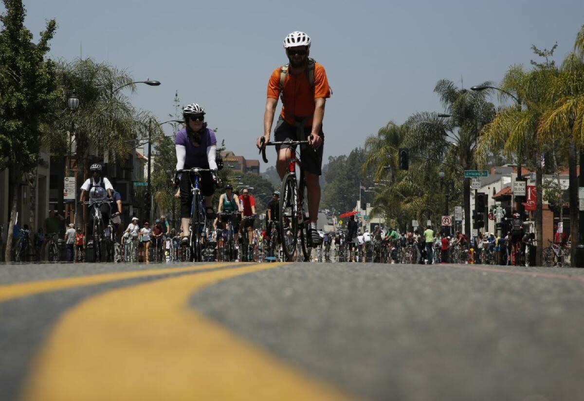 Bicyclists ride down Colorado Boulevard in Pasadena during a CicLAvia in May.