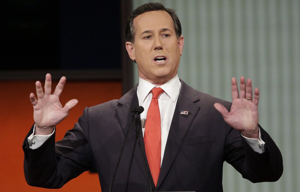 FILE - Republican presidential candidate, former Pennsylvania Sen. Rick Santorum speaks during the Fox Business Network Republican presidential debate in North Charleston, S.C. on Jan. 14, 2016. The CNN analyst went on the network to try and explain comments about Native Americans that have led to criticism, but didn't appear to calm things down. Santorum told a group of young conservative last month that there was ‘nothing here’ when immigrants founded the United States. That angered Native Americans and others. He said on CNN Monday that he was speaking in context of the U.S. government's creation and didn't mean to minimize treatment of Native Americans. (AP Photo/Chuck Burton, File)
