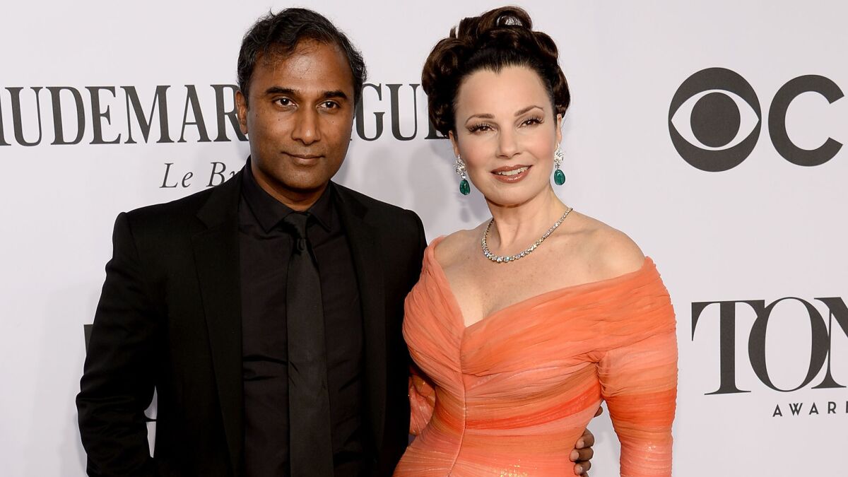 Scientist Shiva Ayyadurai and actress Fran Drescher quietly wed. According to People magazine, she wore Badgley Mischka, he wore Ralph Lauren.