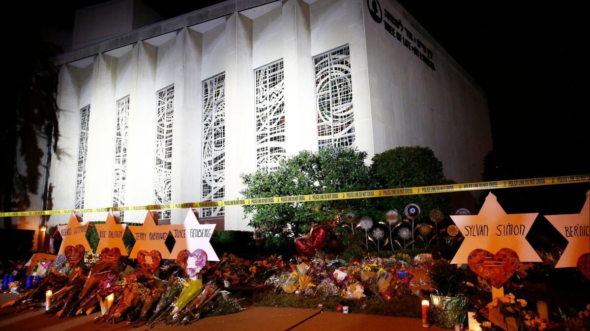The Star of David memorials are lined with flowers at the Tree of Life synagogue two days after a mass shooting in Pittsburgh, Pennsylvania on October 29.