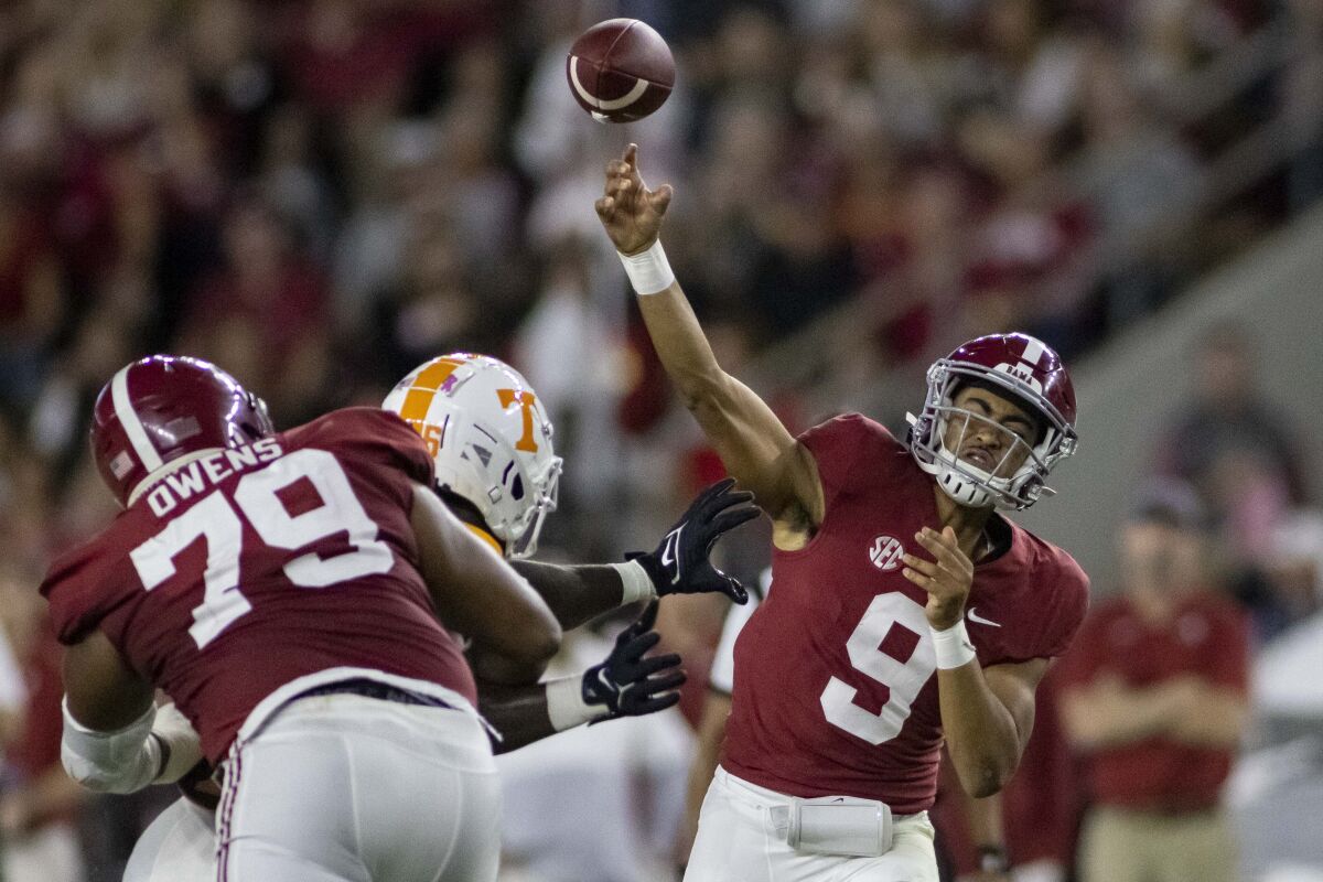 Alabama quarterback Bryce Young throws a pass during the first half of the team's NCAA college football game against Tennessee, Saturday, Oct. 23, 2021, in Tuscaloosa, Ala. (AP Photo/Vasha Hunt)