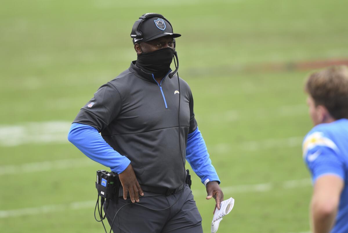 Chargers coach Anthony Lynn walks on the sideline during Sunday's loss to the Buccaneers.