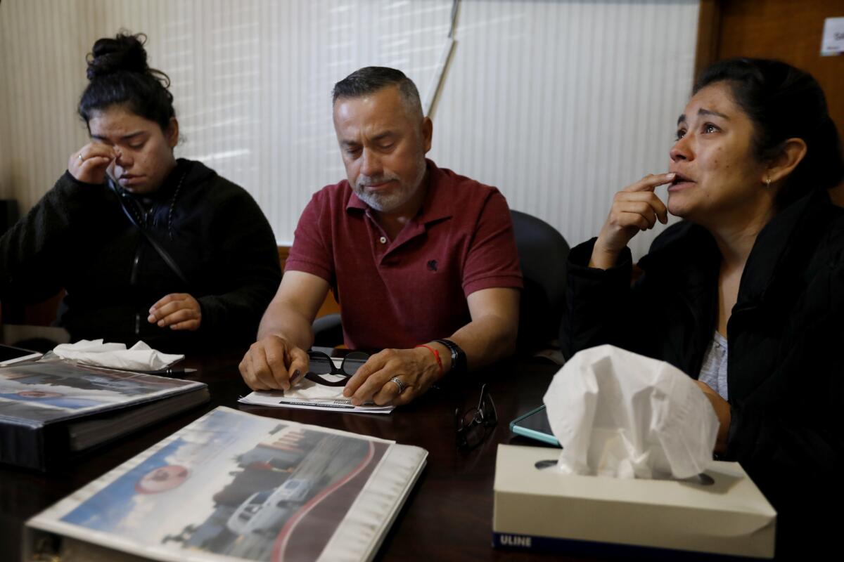 Jocelyn, Hector and Maria Torres of La Puente at Continental Funeral Home in East L.A., making arrangements for Matthew Torres, who died this week at the age of 10 after two years with cancer.