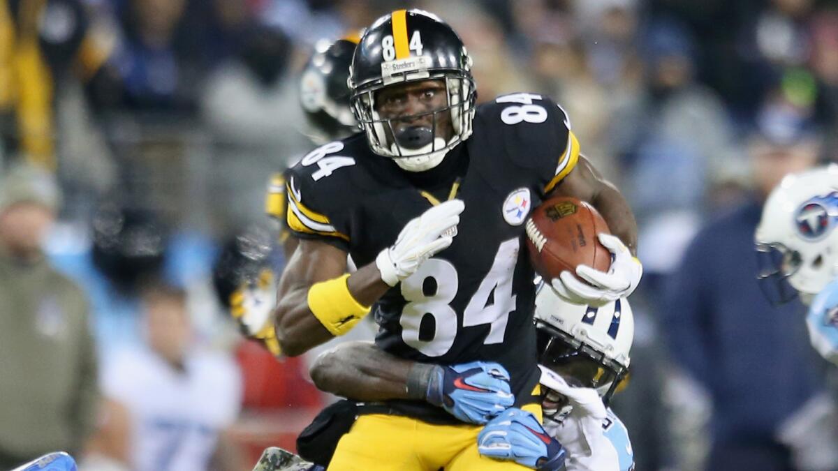Pittsburgh Steelers wide receiver Antonio Brown runs with the ball during the second quarter of a 27-24 victory over the Tennessee Titans on Monday night.