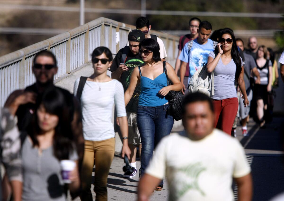 Large crowds of students arrived for classes on the first day of Fall classes at Glendale Community College on September 3, 2013.