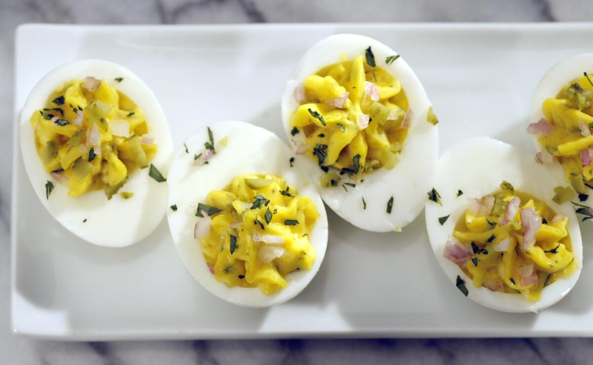 Deviled eggs with tarrragon and cornichons.