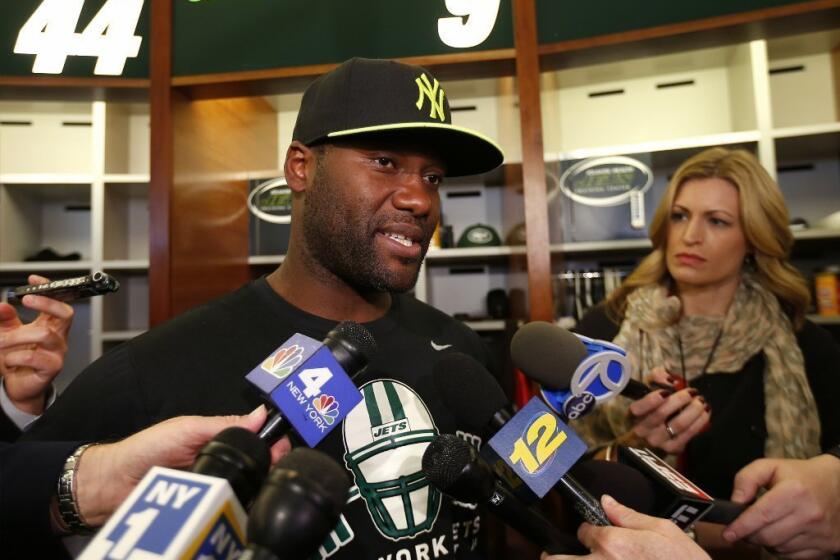 David Garrard speaks to reporters at the Jets training camp this month.
