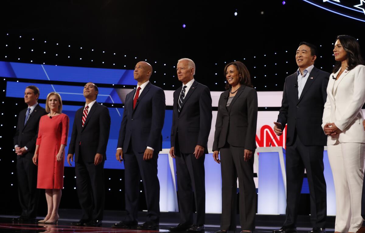 Kamala Harris and fellow Democratic candidates before a July debate in Detroit. 