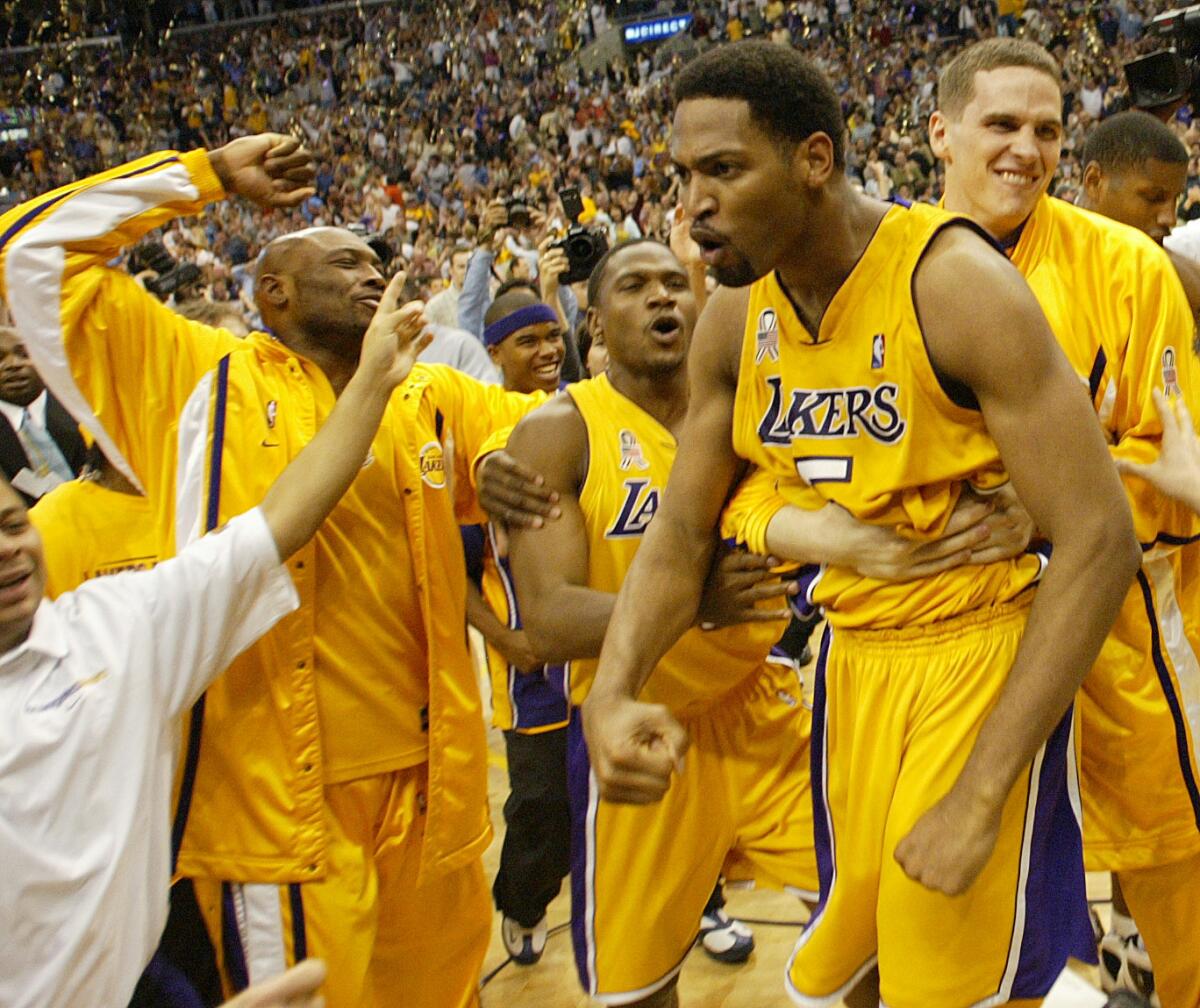 Robert Horry is swarmed by teammates after making the winning shot in the 2002 Western Conference finals.