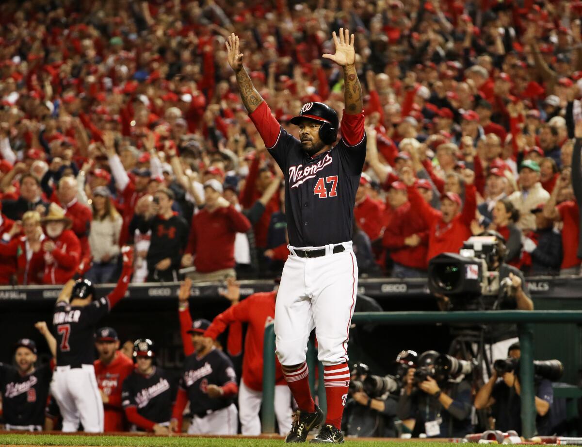 *** BESTPIX *** WASHINGTON, DC - OCTOBER 15: Howie Kendrick #47 of the Washington Nationals celebrates a run by Ryan Zimmerman #11 in the first inning against the St. Louis Cardinals during game four of the National League Championship Series at Nationals Park on October 15, 2019 in Washington, DC. (Photo by Patrick Smith/Getty Images) ** OUTS - ELSENT, FPG, CM - OUTS * NM, PH, VA if sourced by CT, LA or MoD **