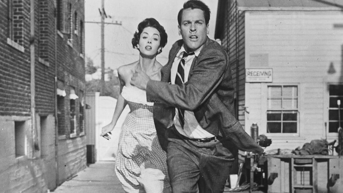 Dana Wynter and Kevin McCarthy in the 1956 film "Invasion of the Body Snatchers."