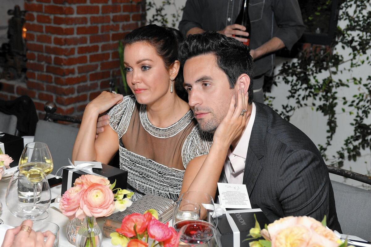 "Scandal" actress Bellamy Young and "The Mindy Project" actor Ed Weeks attend a dinner celebrating Young's costar Kerry Washington at A.O.C.