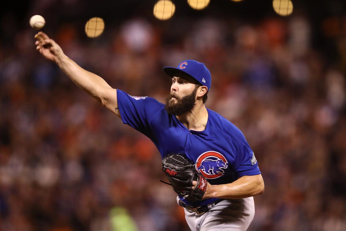 Cubs pitcher Jake Arrieta (49) throws a pitch against the San Francisco Giants during Game 3 of the NLDS at AT&T Park on Oct. 10.