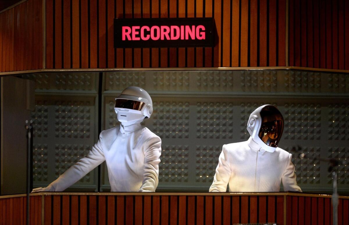 Thomas Bangalter and Guy-Manuel de Homem-Christo of Daft Punk perform at the Grammys in 2014.
