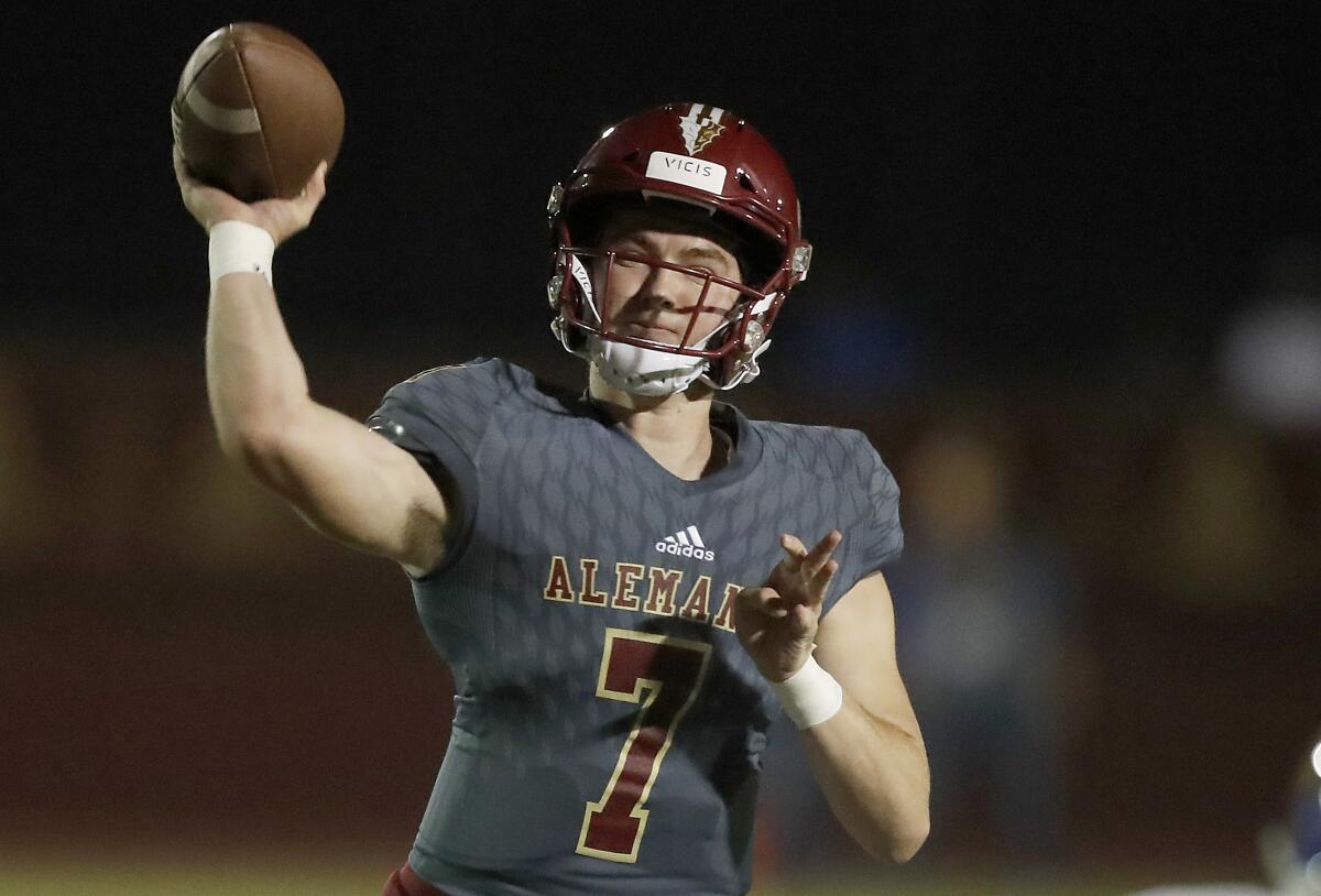 MISSION HILLS, CALIF. - SEP. 27, 2019. Bishop Alemany quarterback Miller Moss throws downfield againt Bishop Amat.