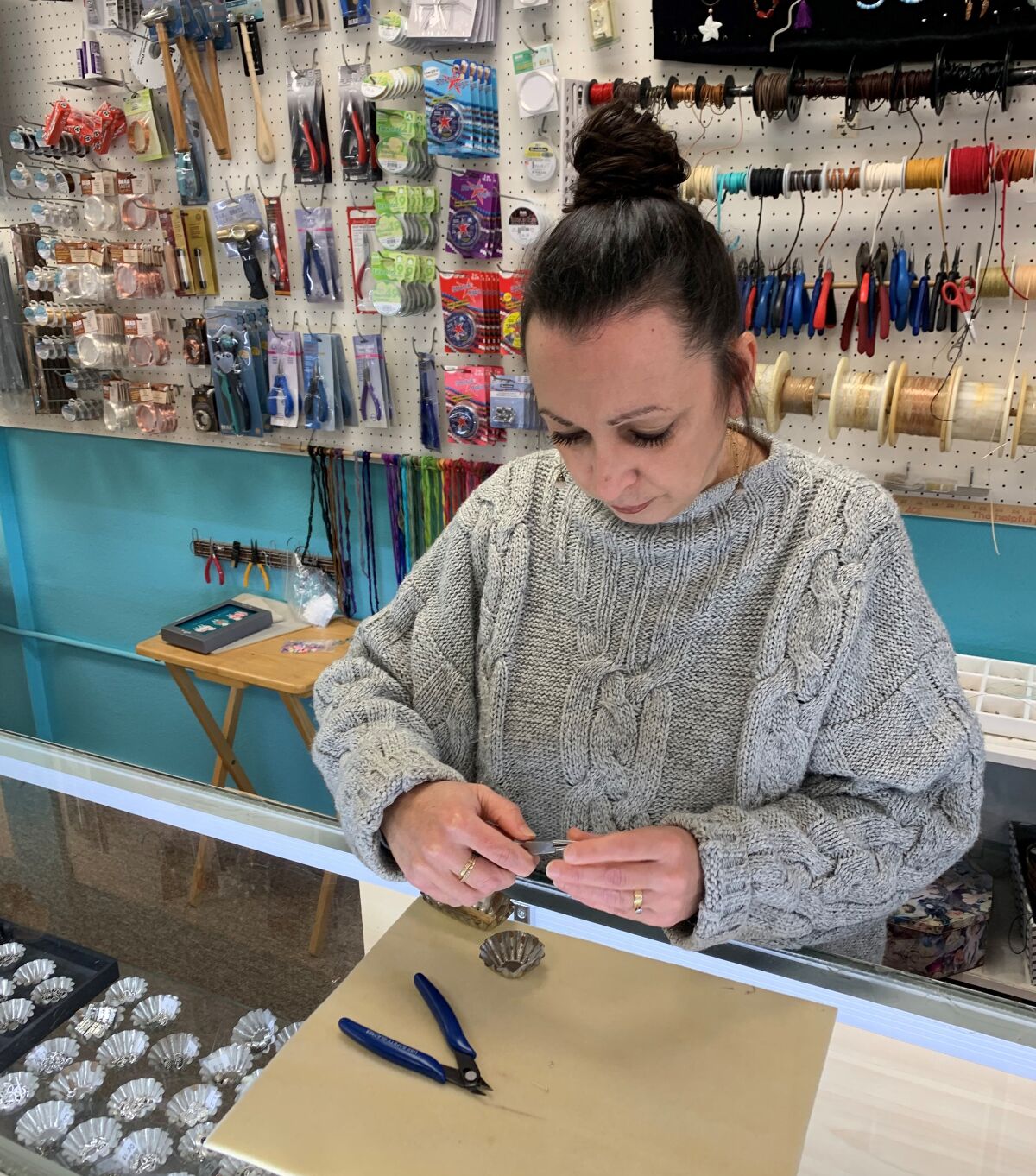 Julia Candillo, owner of Beads and More, has worked on beading projects nearly every day since 1993.